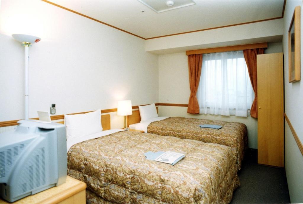 Toyoko Inn Niigata Ekimae Habitación foto